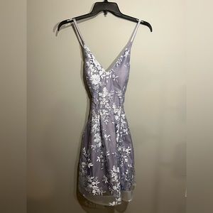 BCX dress juniors size 9! Will fit a woman size S. Purple with floral designs.